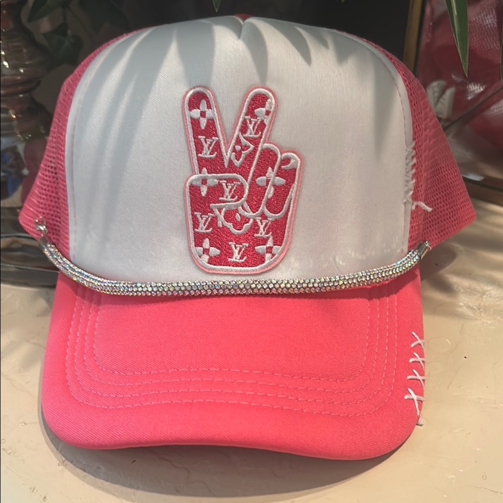 Pink LV Peace rhinestone trucker hat